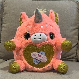 Rainbowcorn Pink and Gold Plush Monster with Friendly Smile